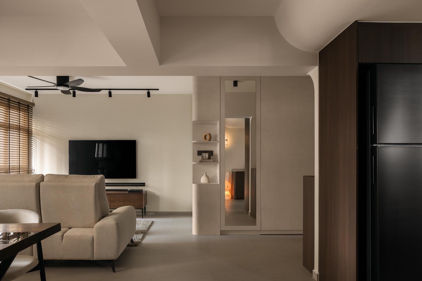 Modern Living Room with Bookshelf and Homogeneous Tiles
