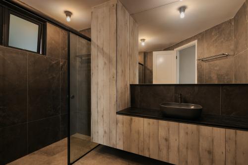 Industrial Bathroom at Costa Rhu II
