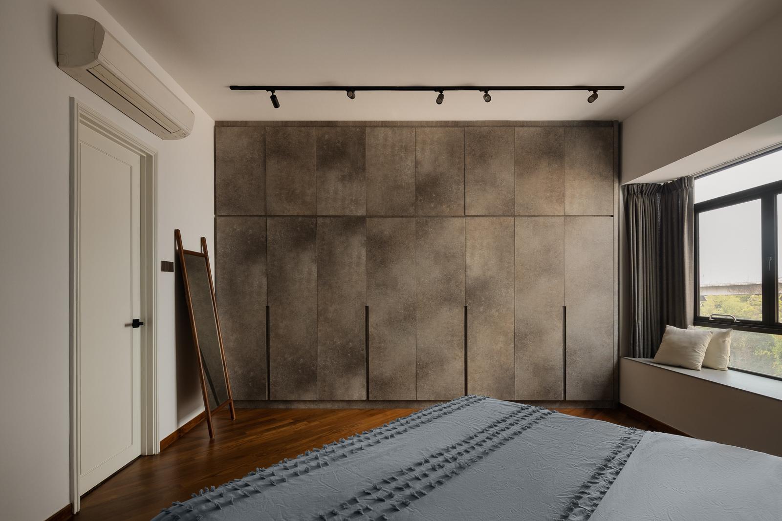 Industrial Bedroom with Wood Flooring and Bay Window