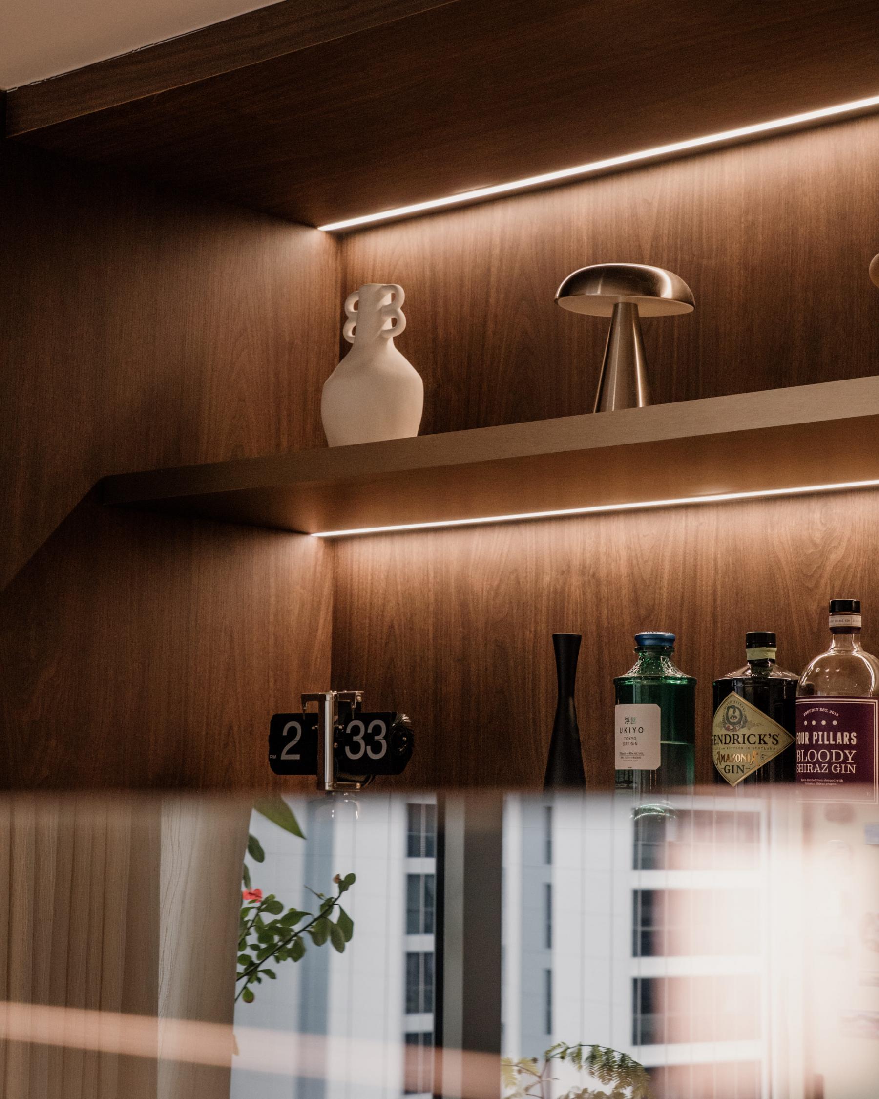 Contemporary Home Bar with Drinkware and Display Cabinets