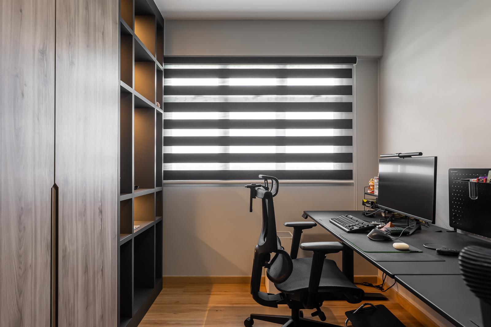 Contemporary Home Office with Bookshelf and Desk Chairs