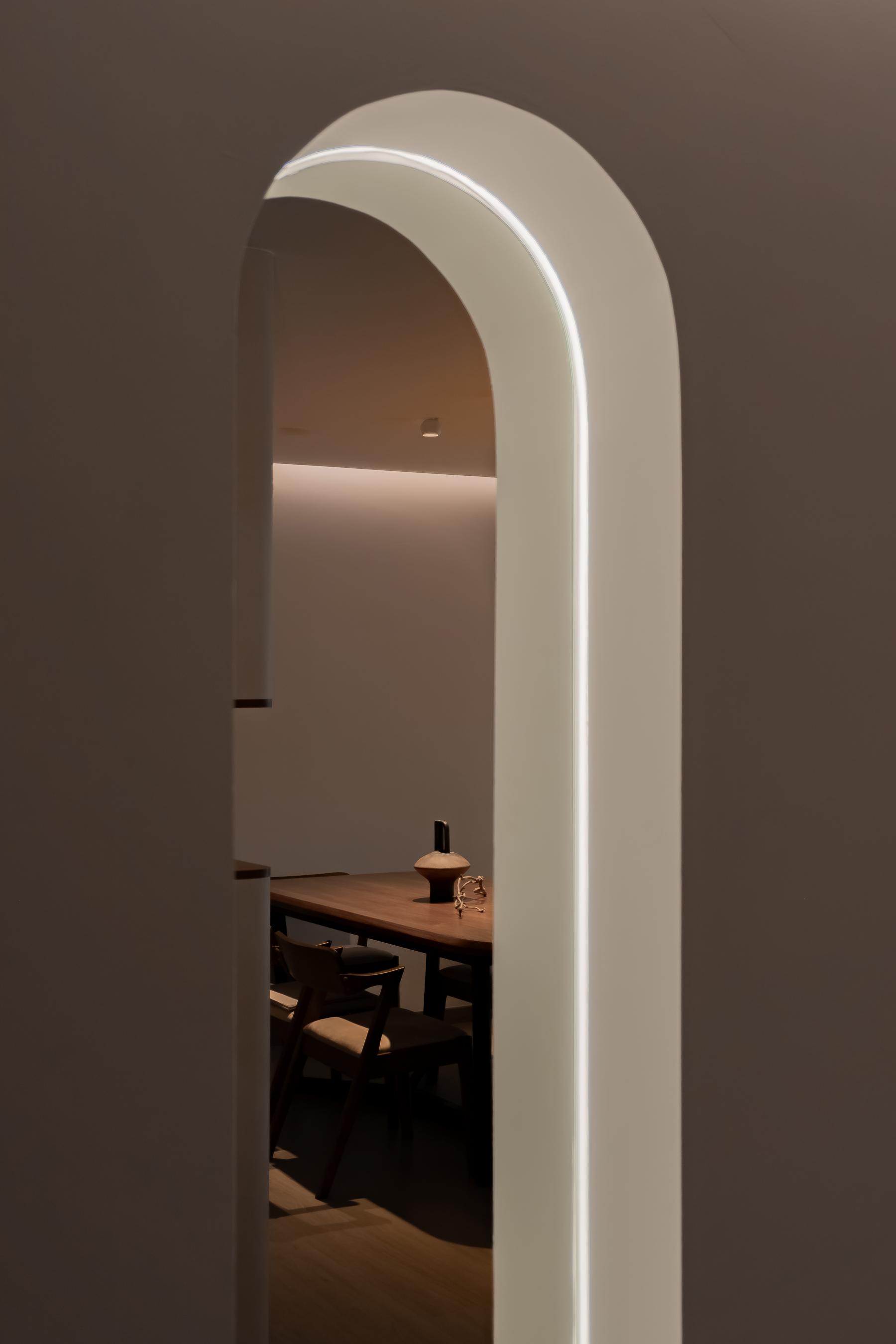 Minimalist Entryway with Mirror and Lighting