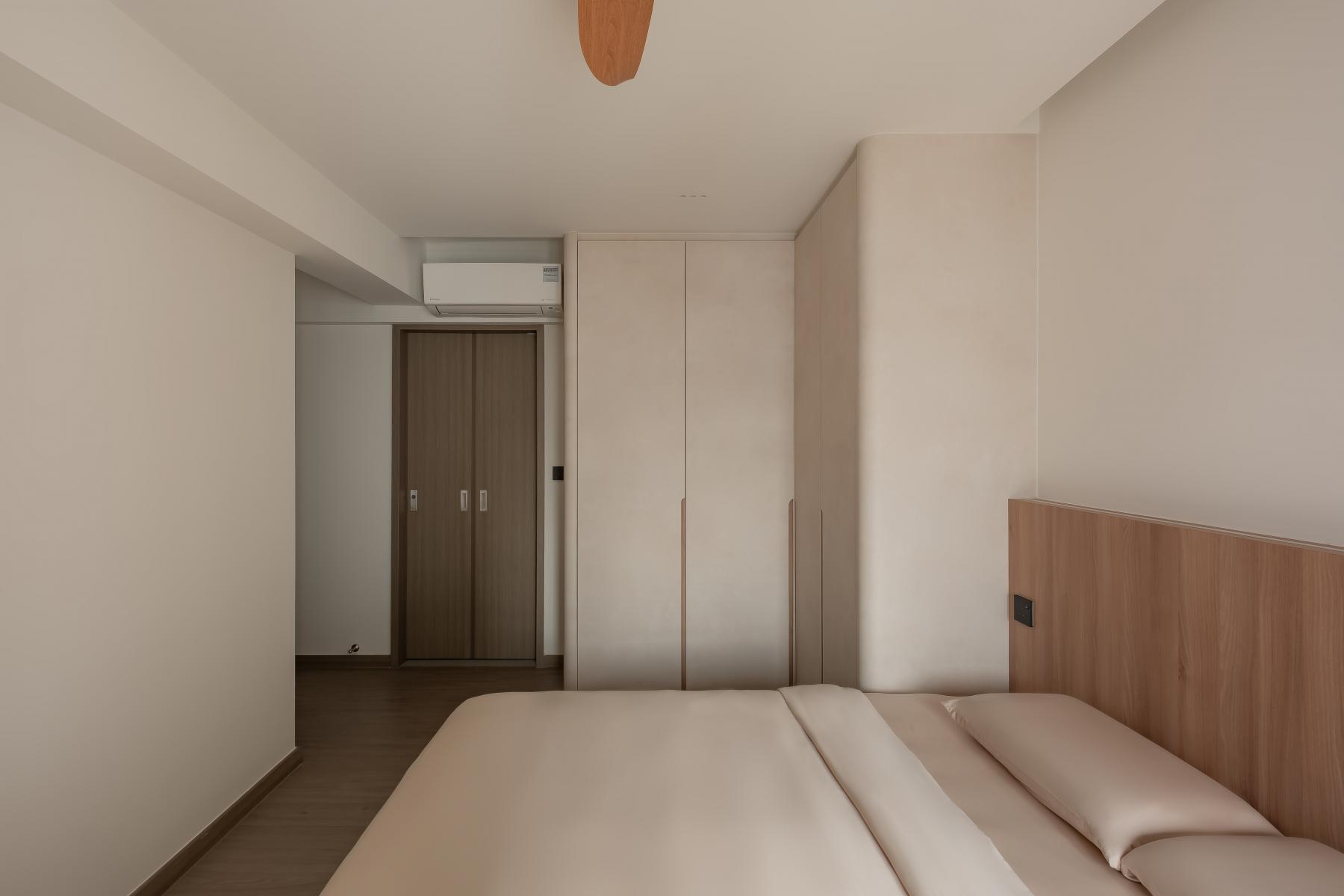 Minimalist Bedroom with Built-in Bed and Closet