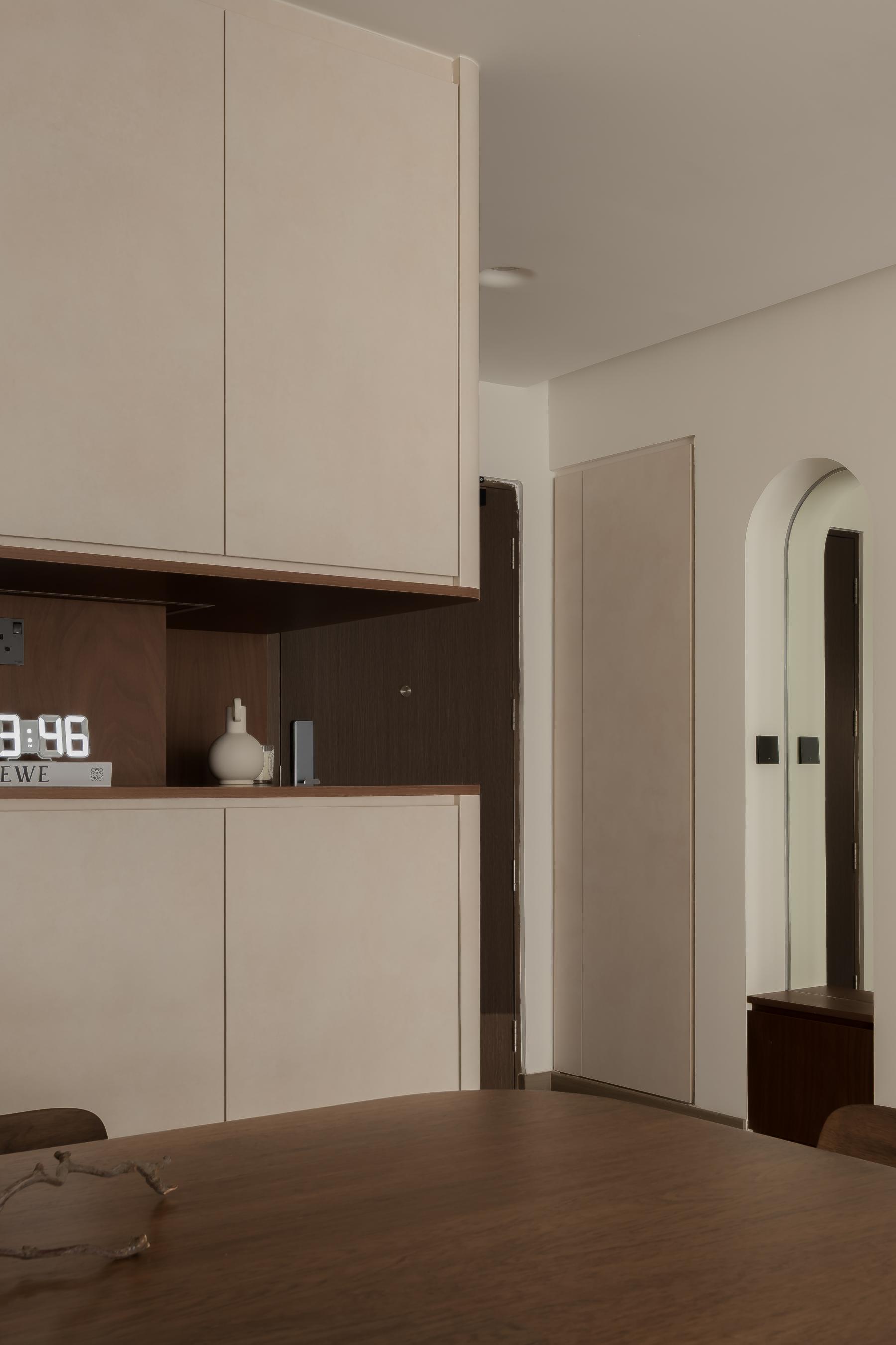 Minimalist Entryway with Settee and Mirror