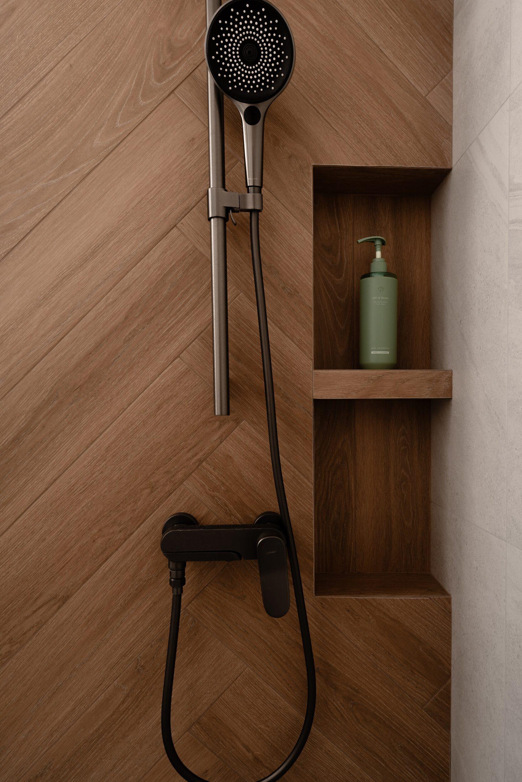 Modern Bathroom with Herringbone Tiling and Bathroom Storage