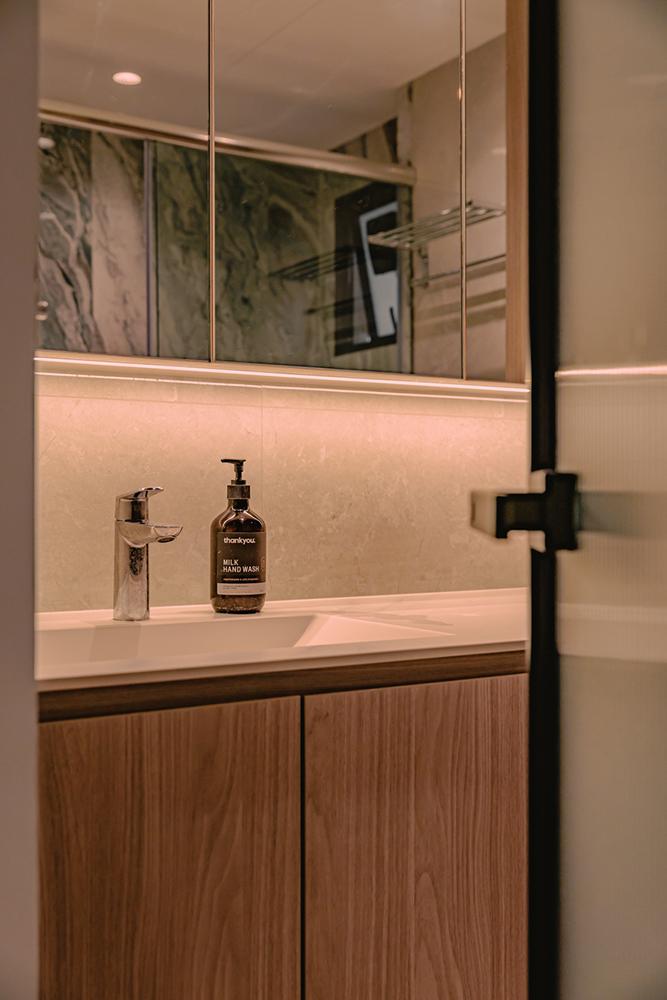 Minimalist Bathroom with Countertop and Mirror