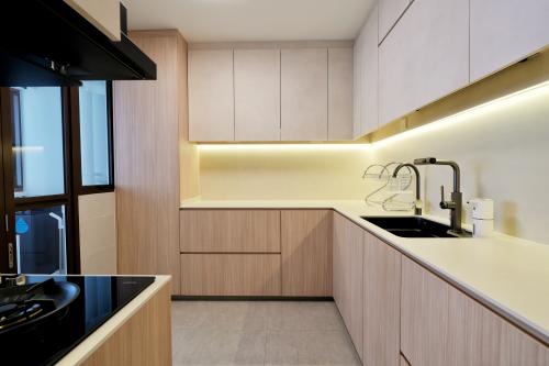 Minimalist Kitchen at 4-room BTO cream