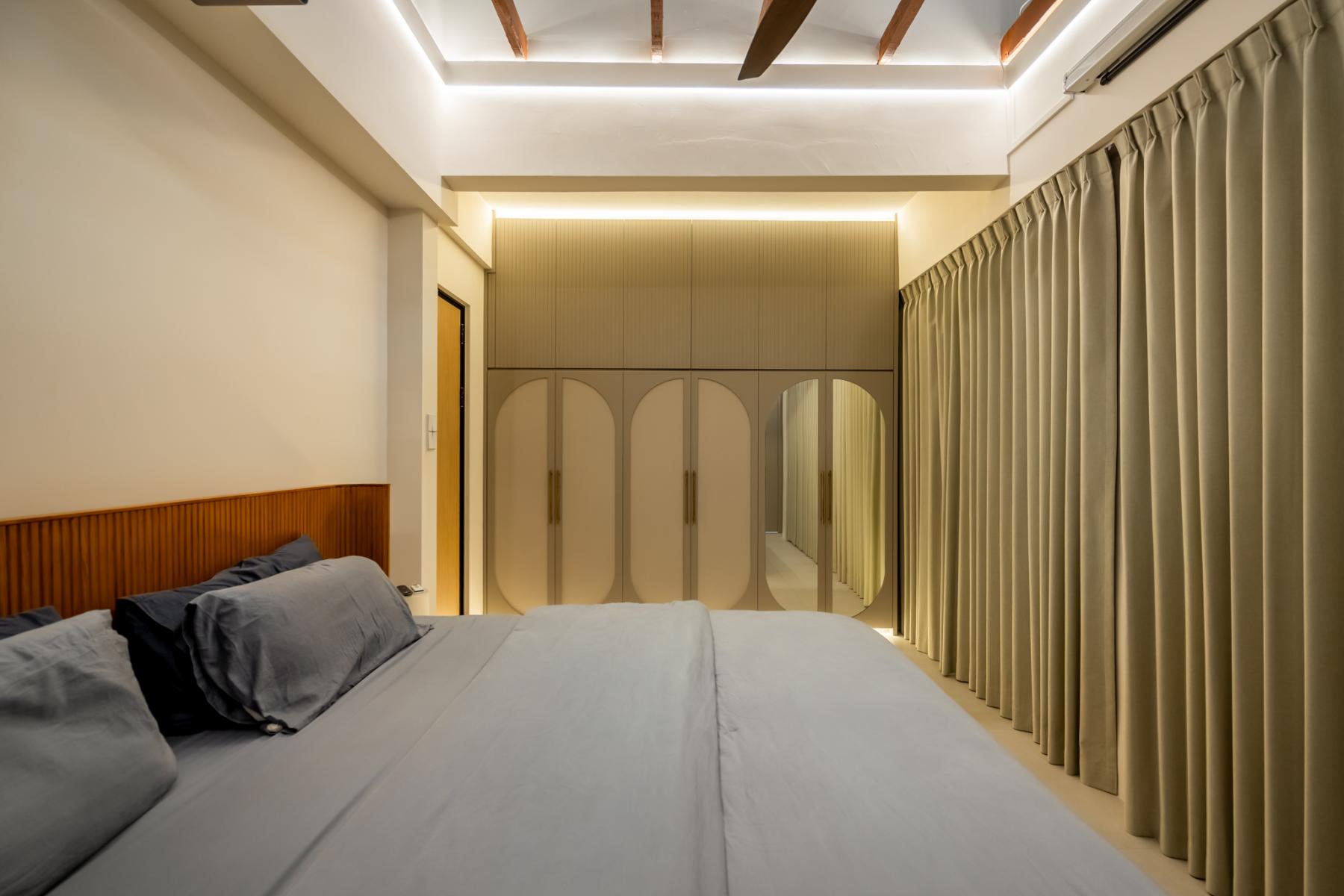 Eclectic Bedroom with Wardrobe and Lighting