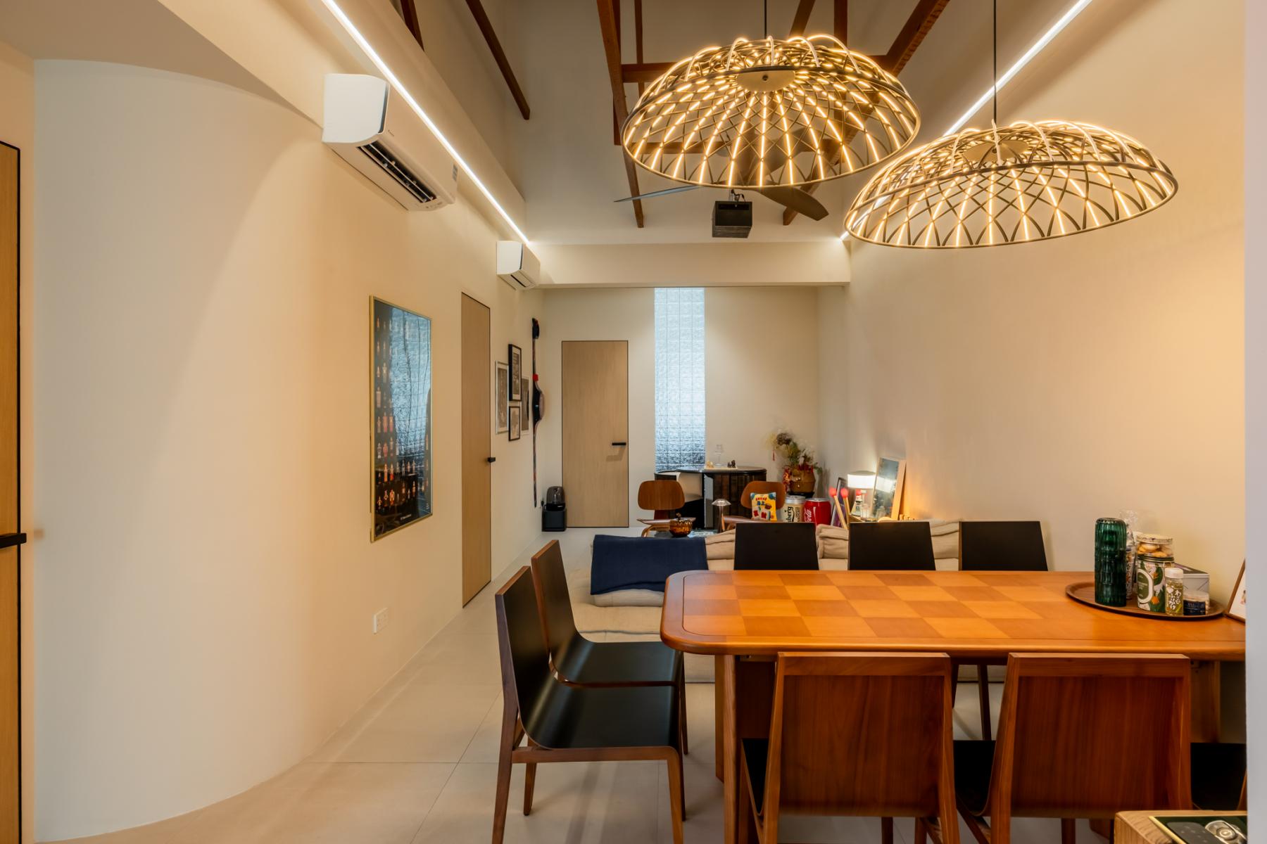Eclectic Dining Room with Cove Lighting and Dining Table
