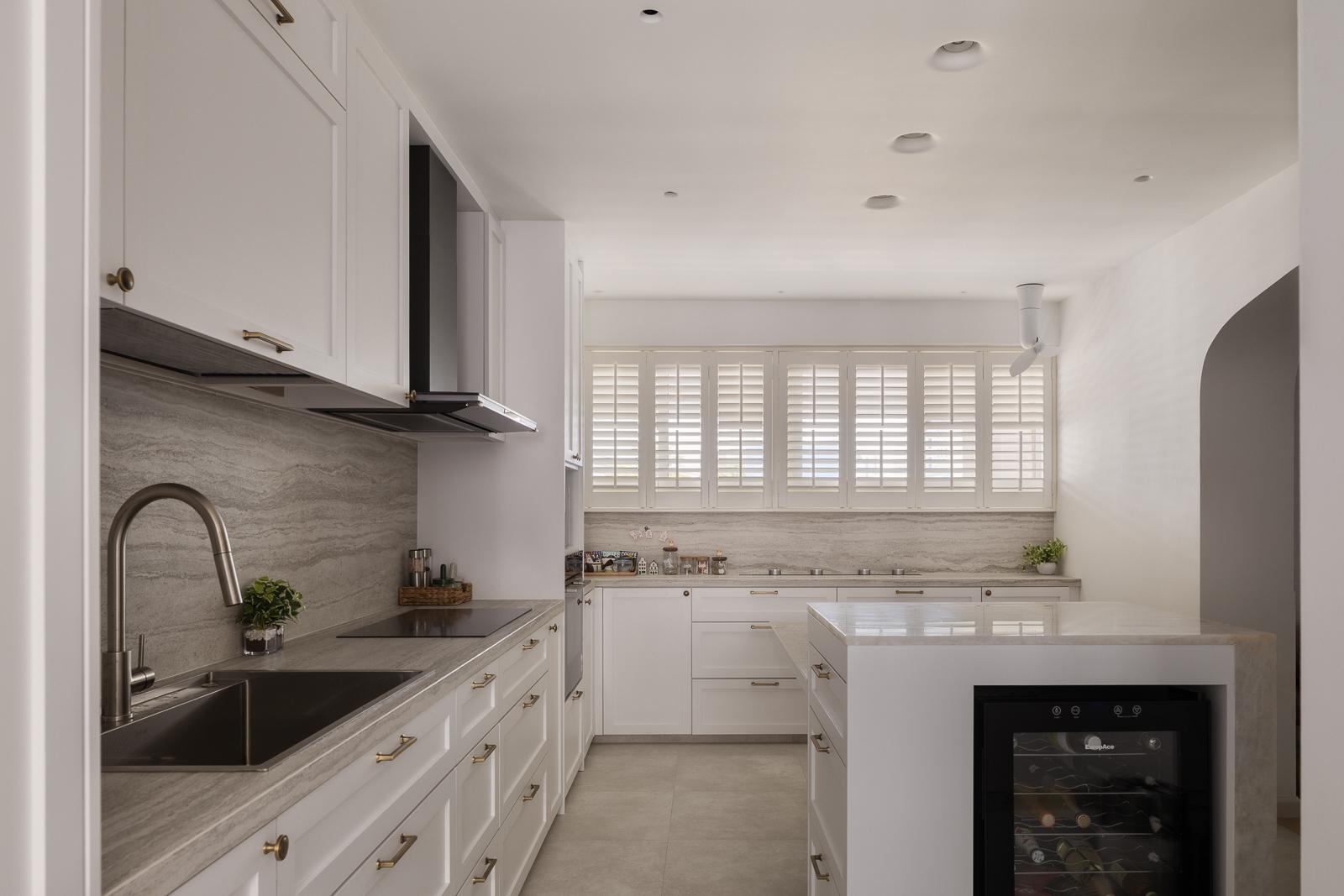Contemporary Kitchen with Kitchen Island and Window Shutters
