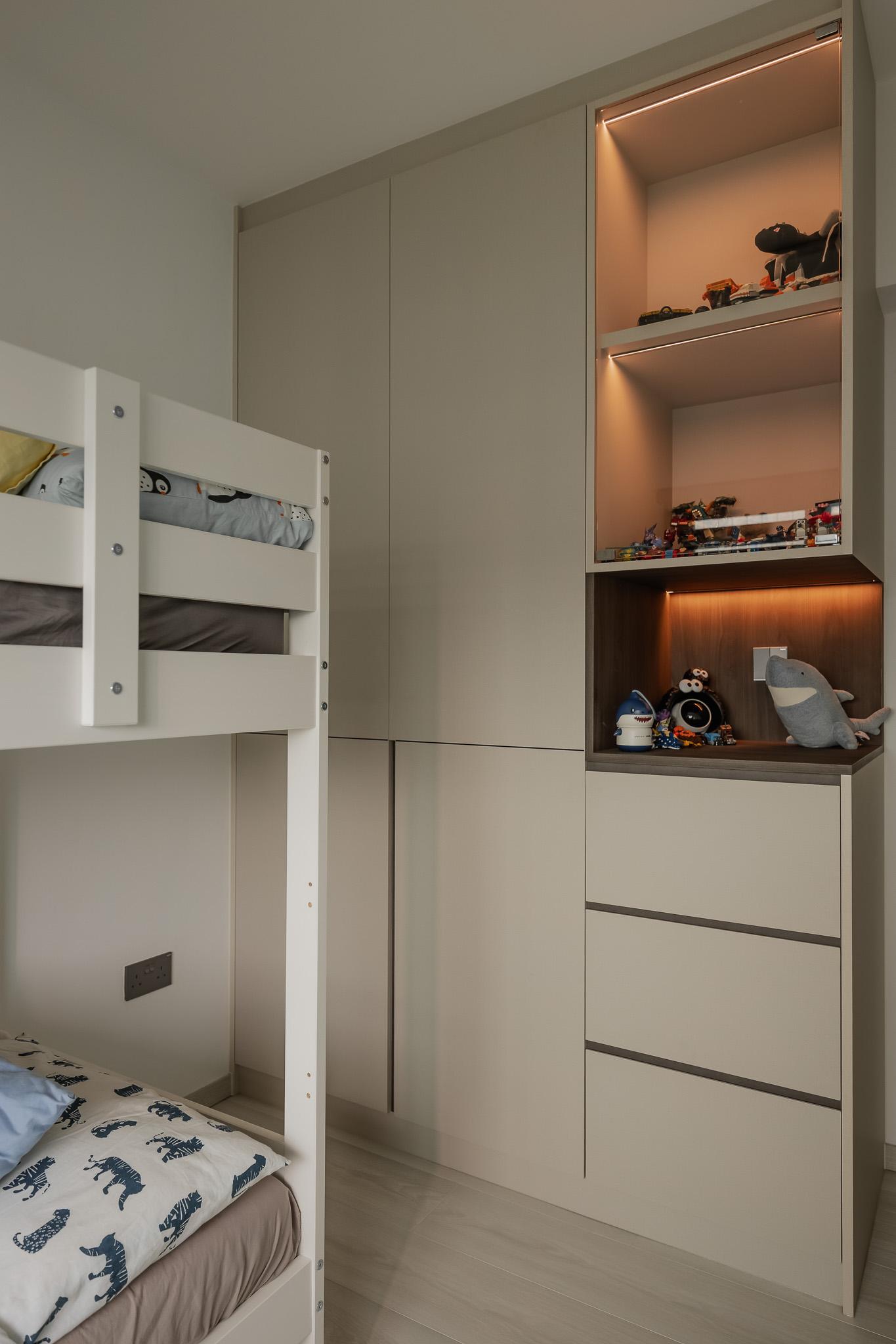 Contemporary Bedroom with Bookshelf and Children's Beds