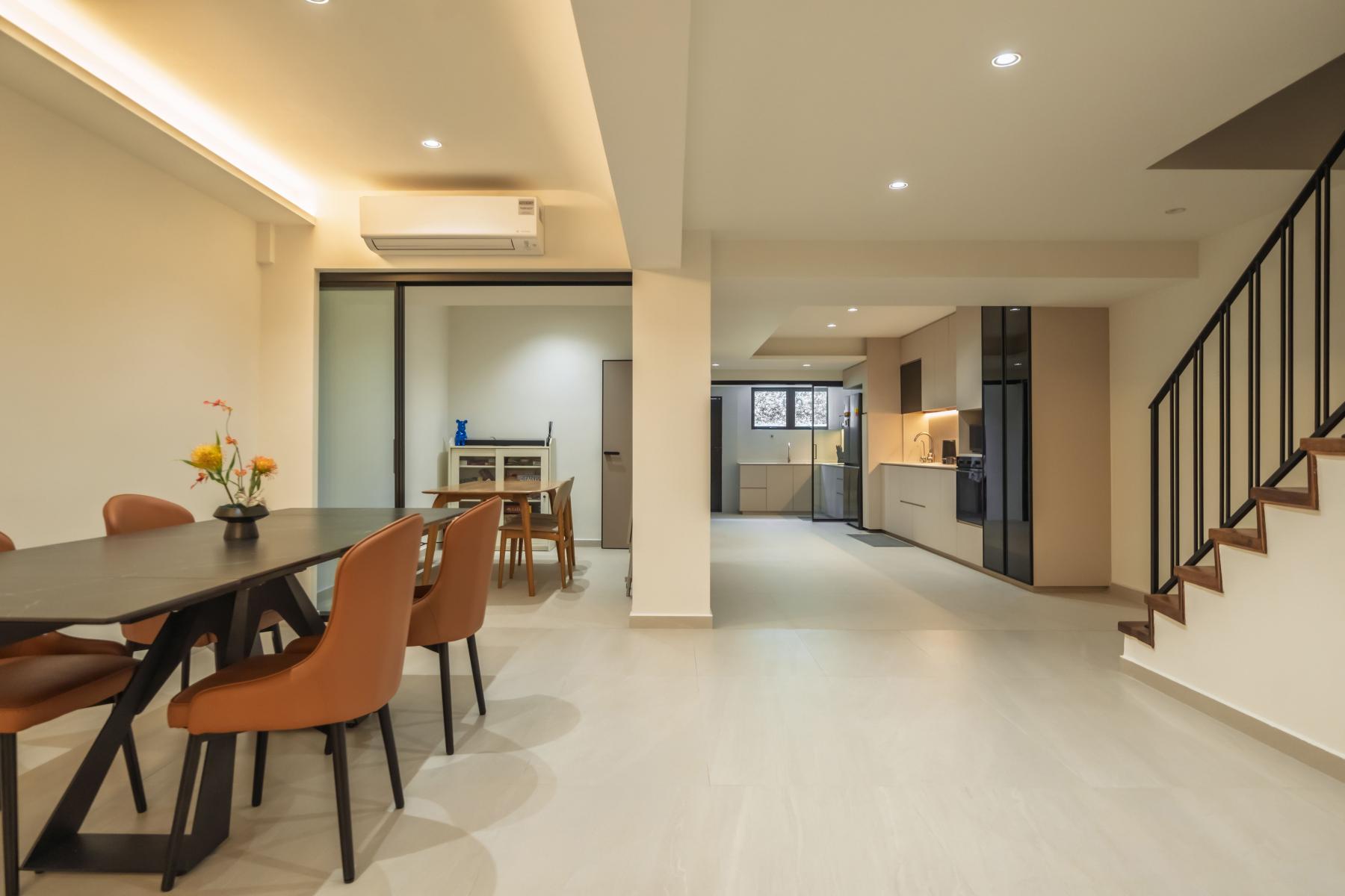 Modern Dining Room with Drop Light and Glass Door