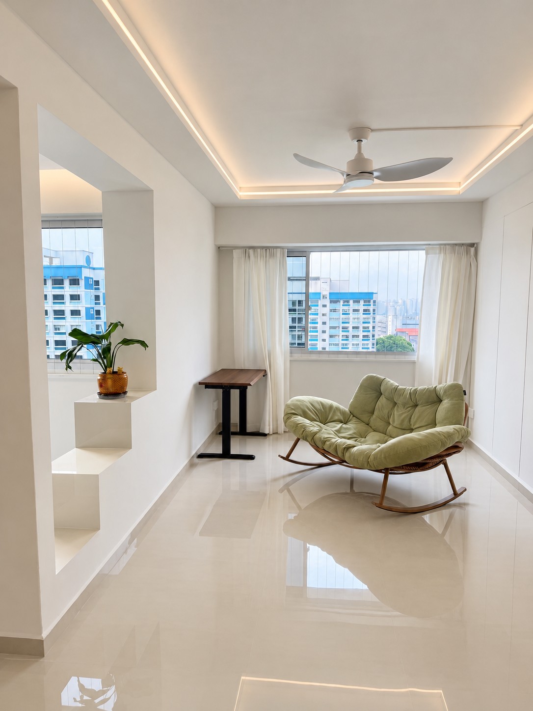 Minimalist Living Room with Bookshelf and Ceiling Fan