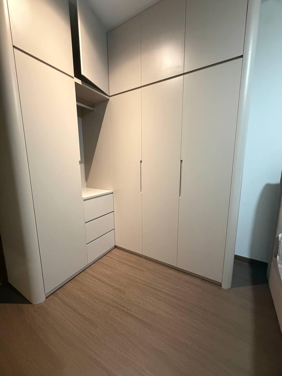 Minimalist Bedroom with Vinyl Flooring and Wardrobe
