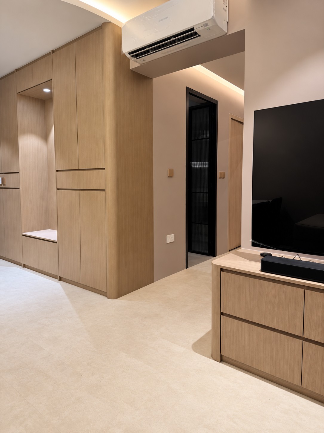 Modern Foyer with Homogeneous Tiles and TV Console