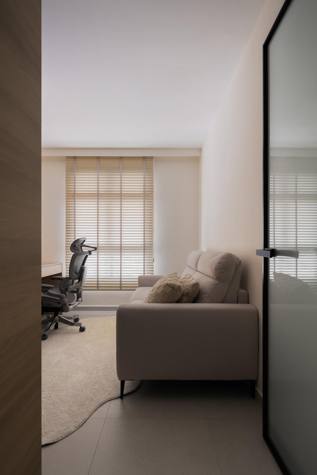 Modern Study with Homogeneous Tiles and Sofa