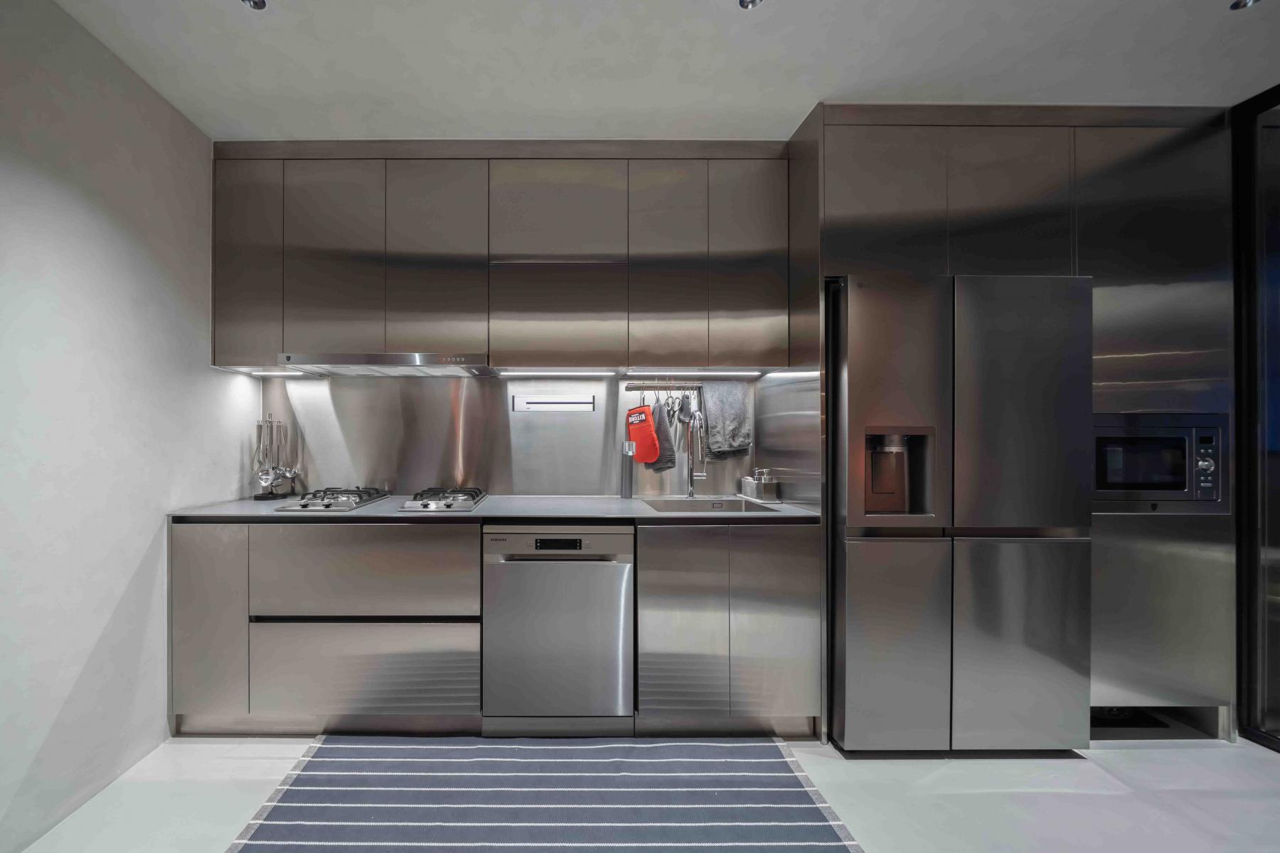 Industrial Kitchen with Kitchen Island and Open Kitchen