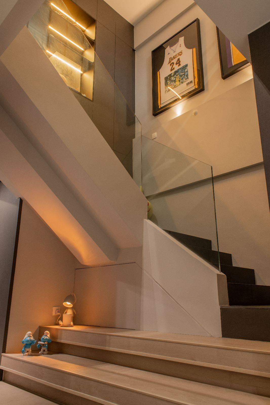 Scandinavian Hallway with Staircase and Artwork
