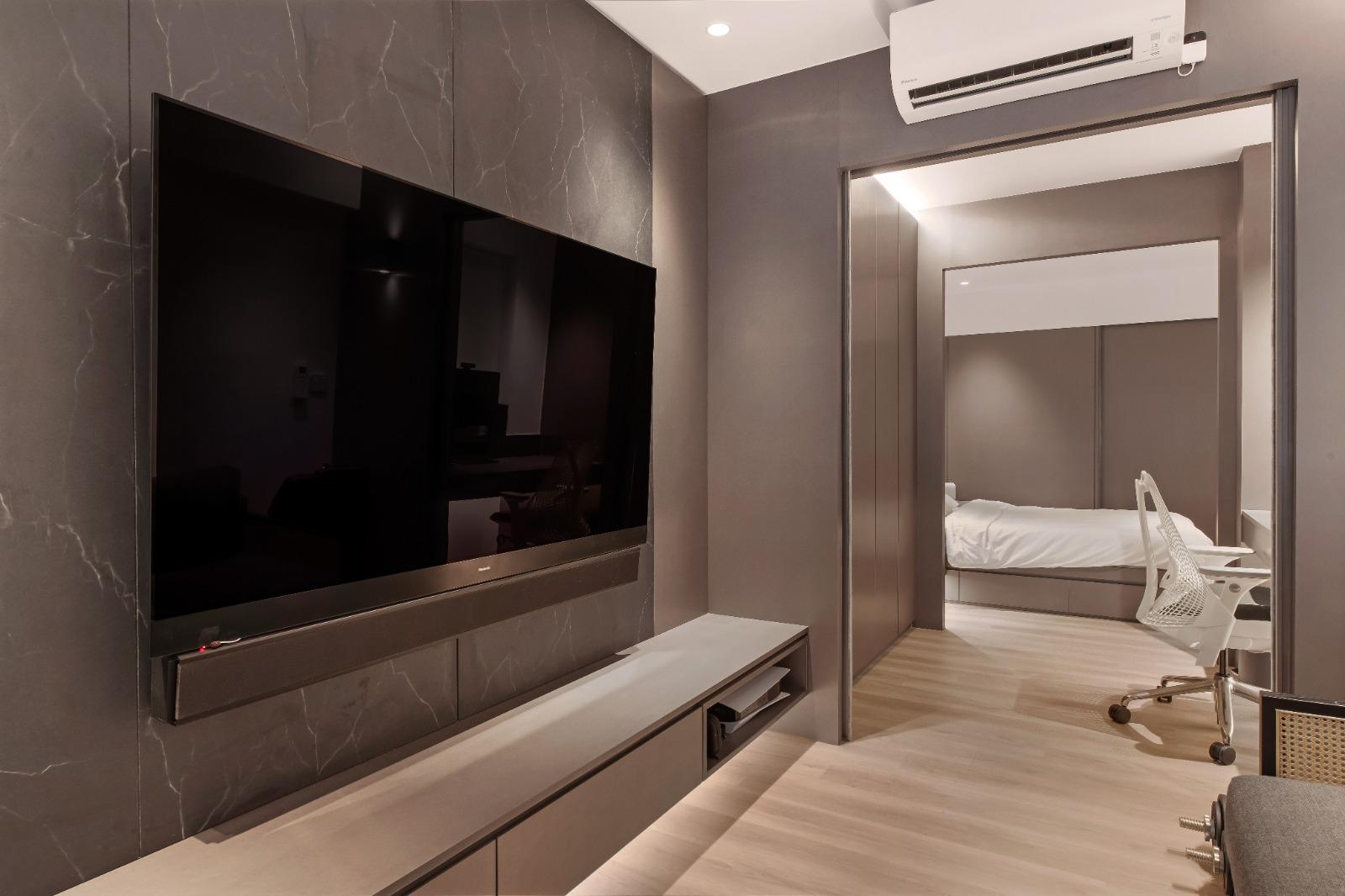 Modern Bedroom with TV and Single Bed