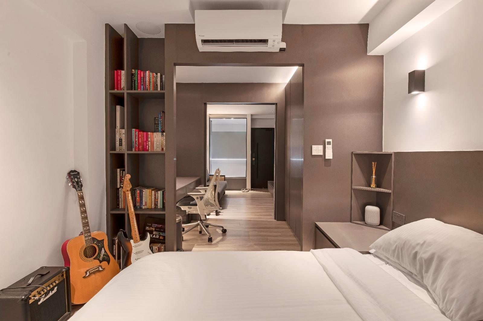 Modern Bedroom with Bookshelf and Wardrobe