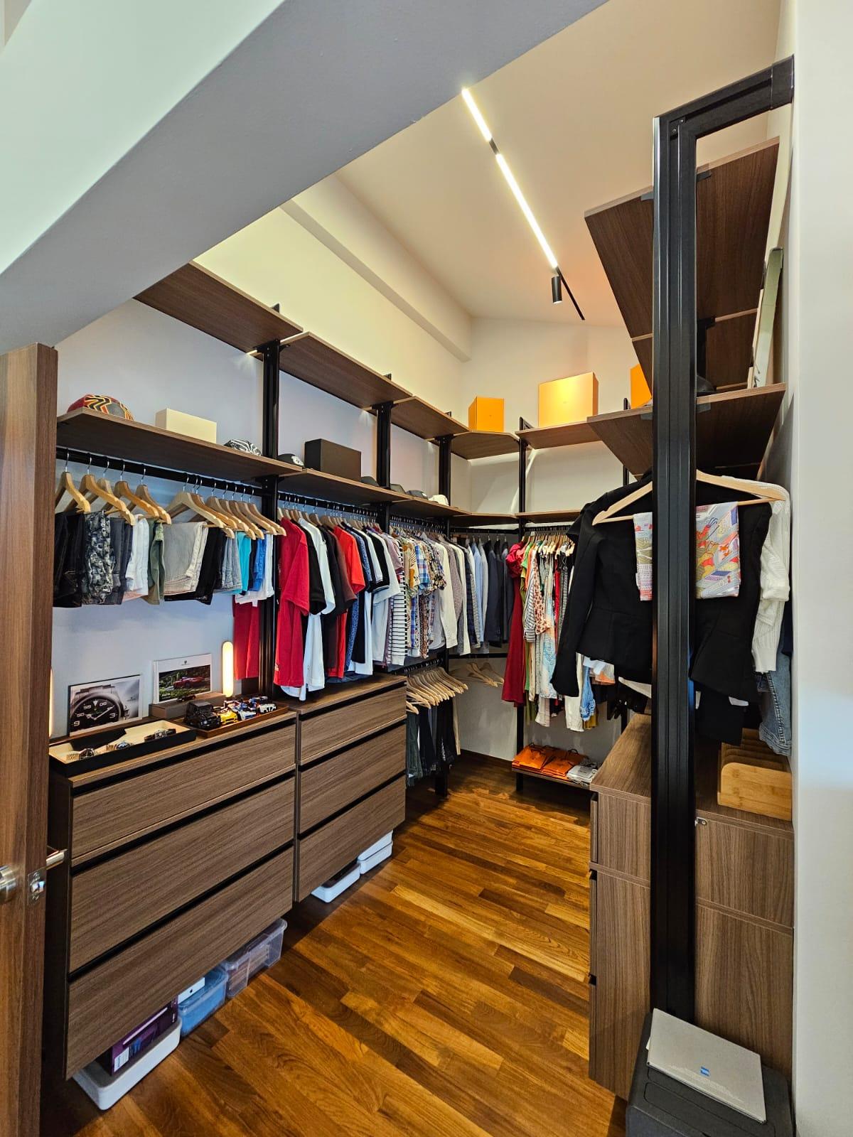 Contemporary Walk-in Wardrobe with Wood Flooring and Wardrobe