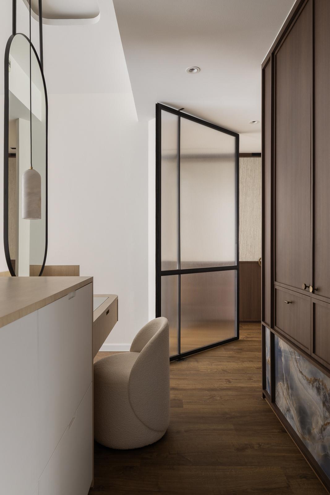 Contemporary Bedroom with Wood Flooring and Mirror