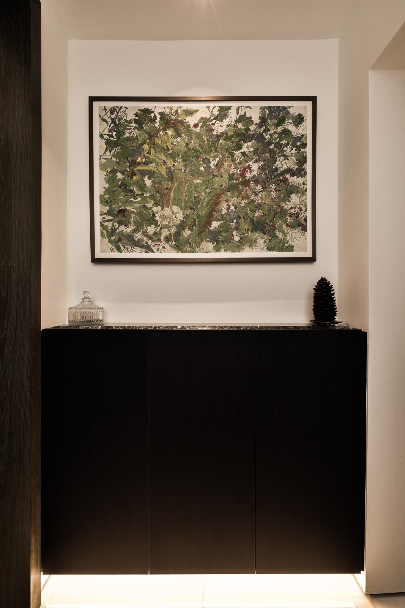Minimalist Foyer with Artwork and Console Table
