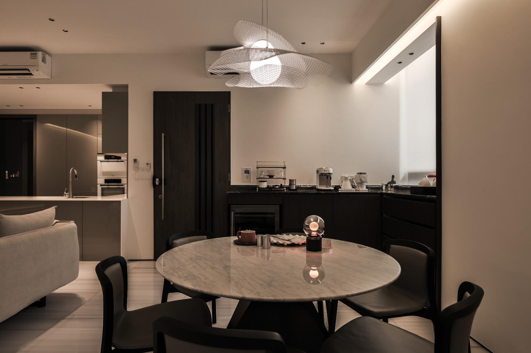 Minimalist Dining Room with Stools and Lighting