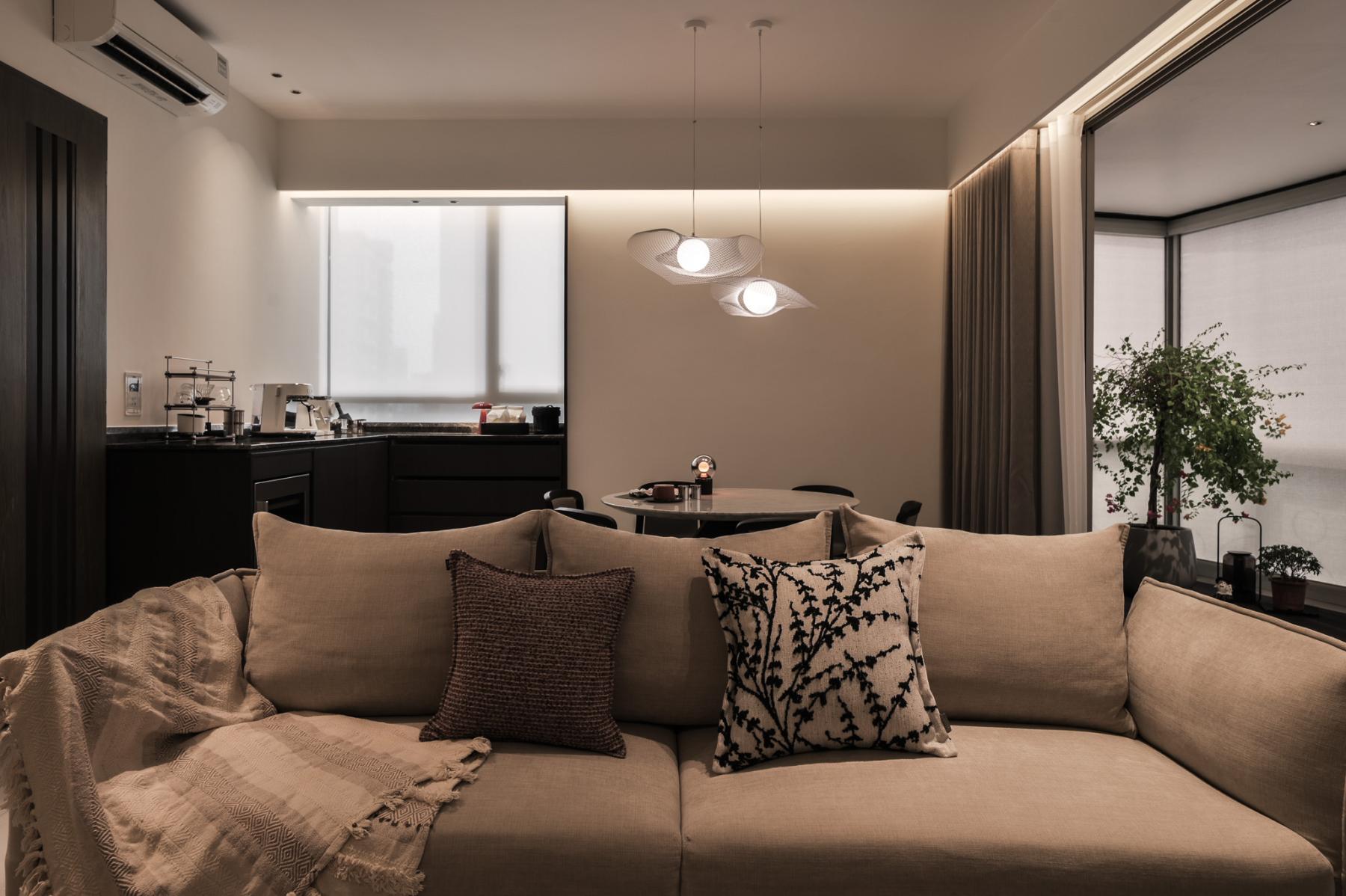 Minimalist Living Room with Cove Lighting and Sofa