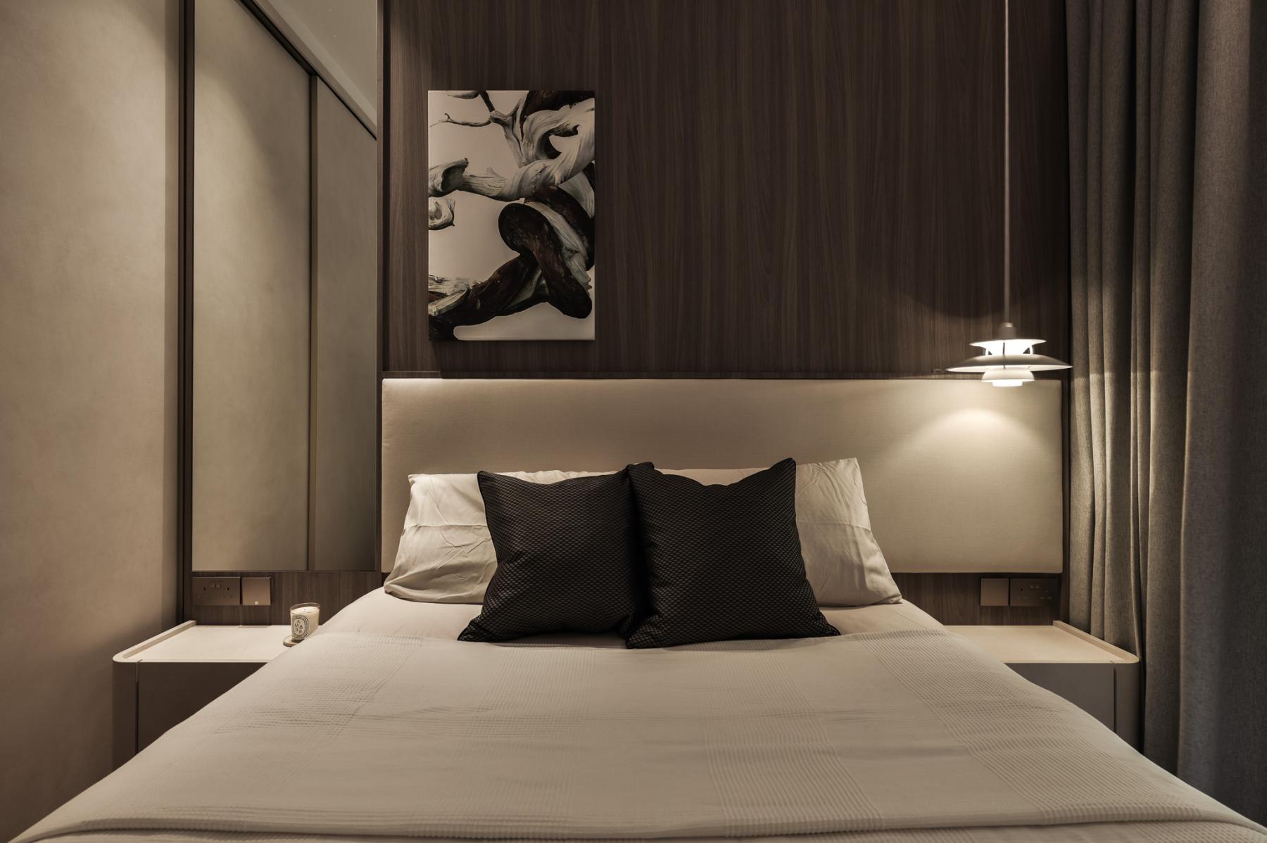 Modern Bedroom with Artwork and Bedside Table