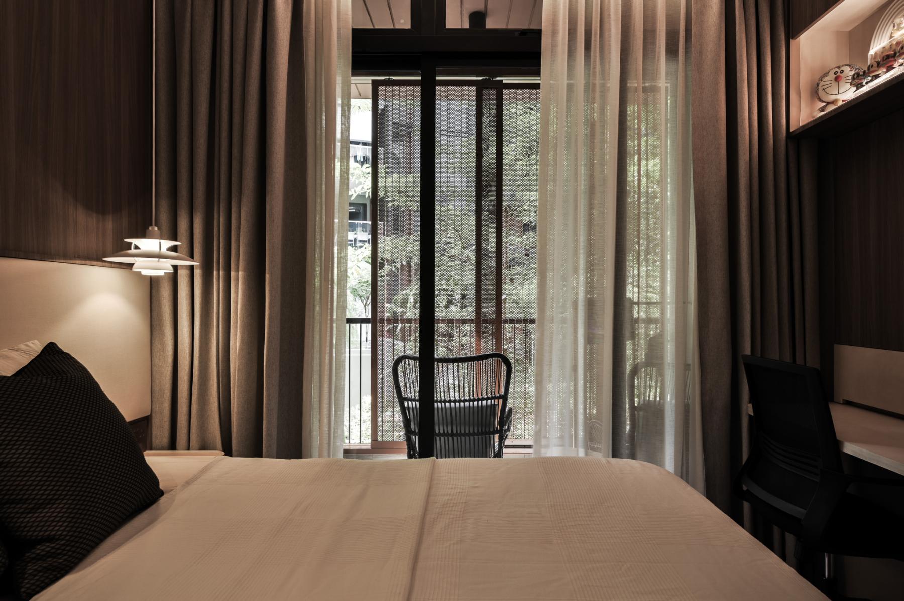 Modern Bedroom with Wood Flooring and Built-in Bed