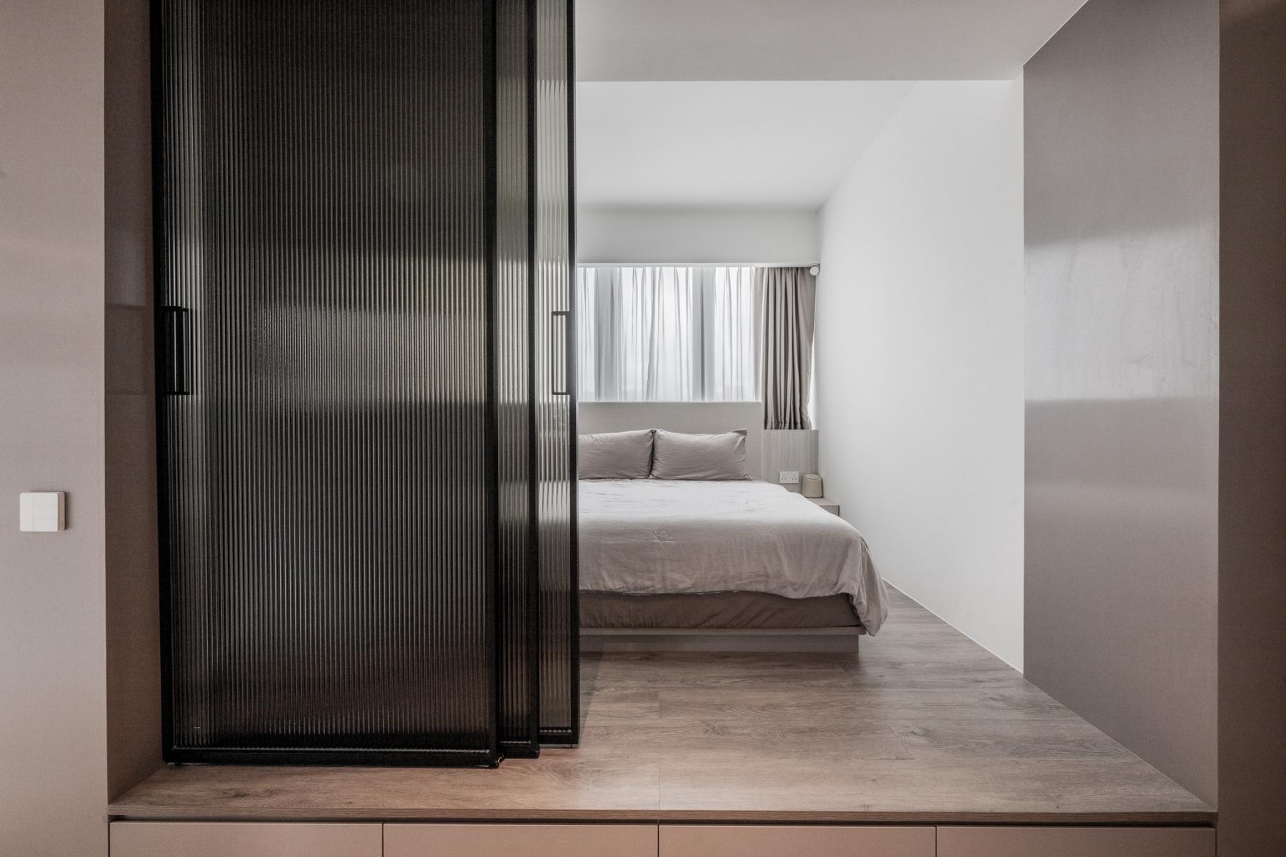Minimalist Bedroom with Drop Light and Bay Window
