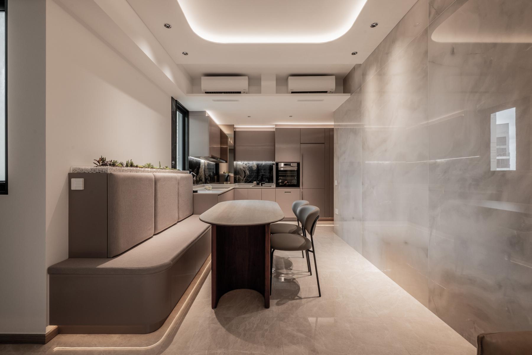 Minimalist Dining Room with Cove Lighting and Chandelier