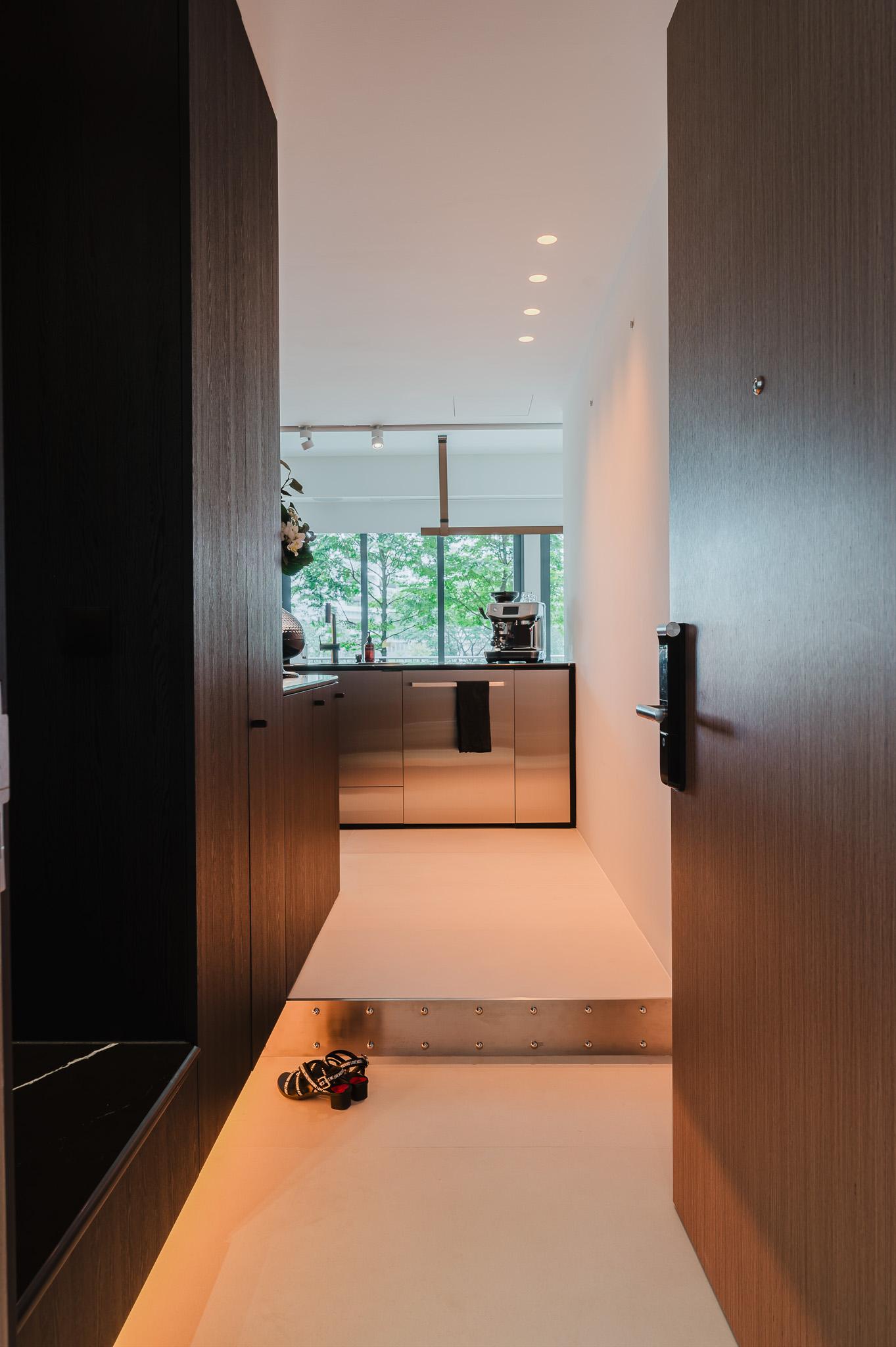 Industrial Foyer with Artwork and Storage Cabinets