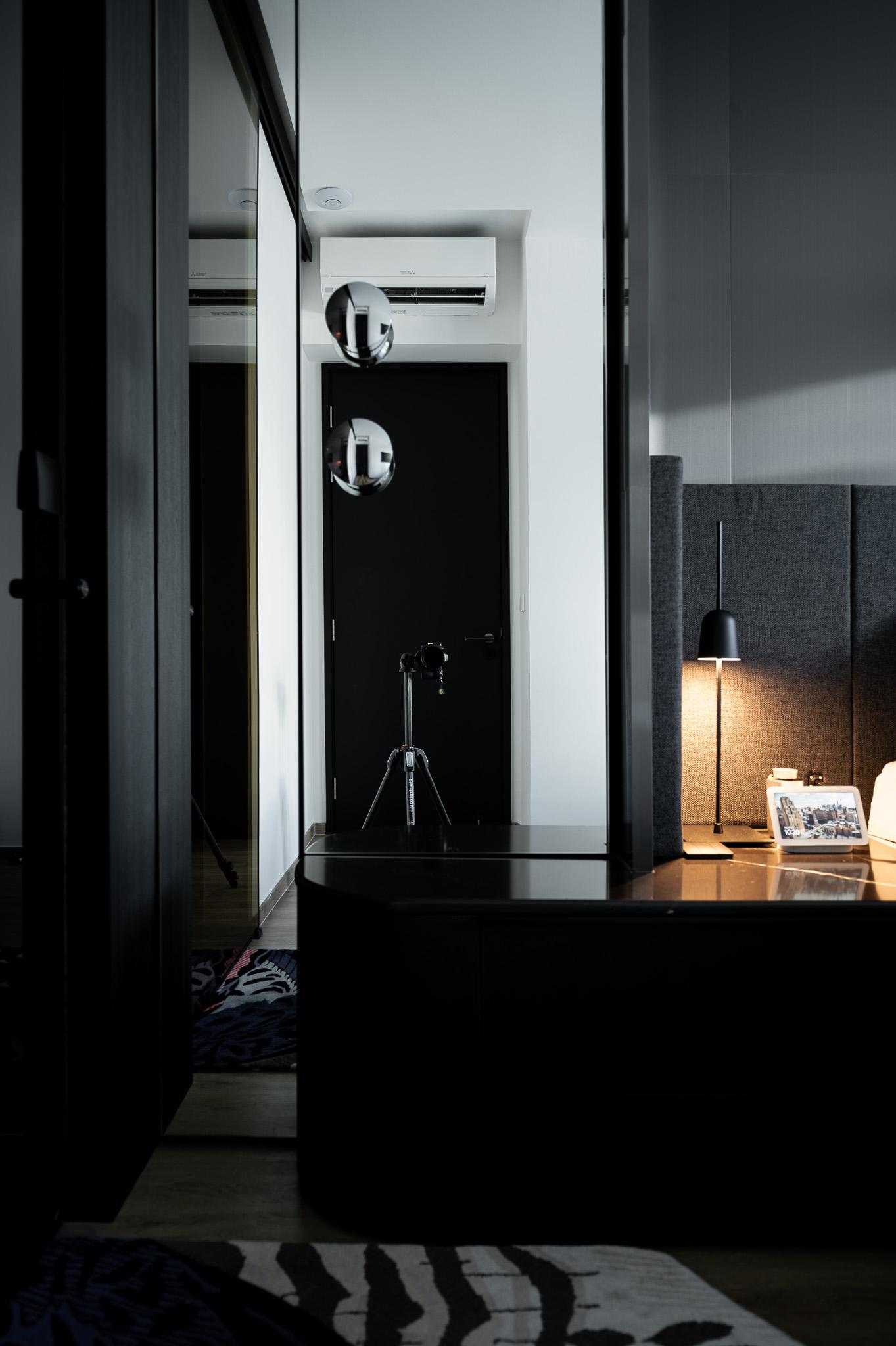 Industrial Bedroom with Mirror and Lighting