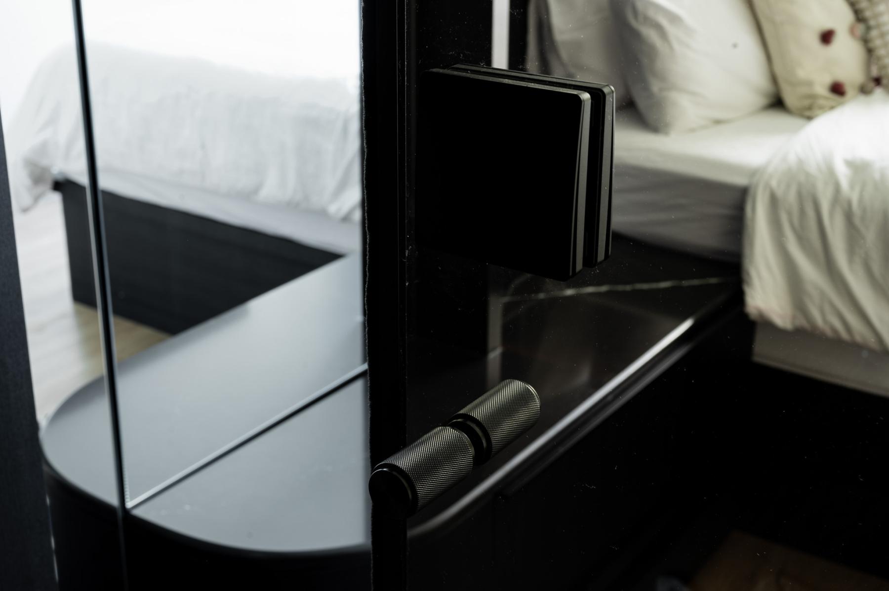 Industrial Bedroom with Cove Lighting and Wardrobe