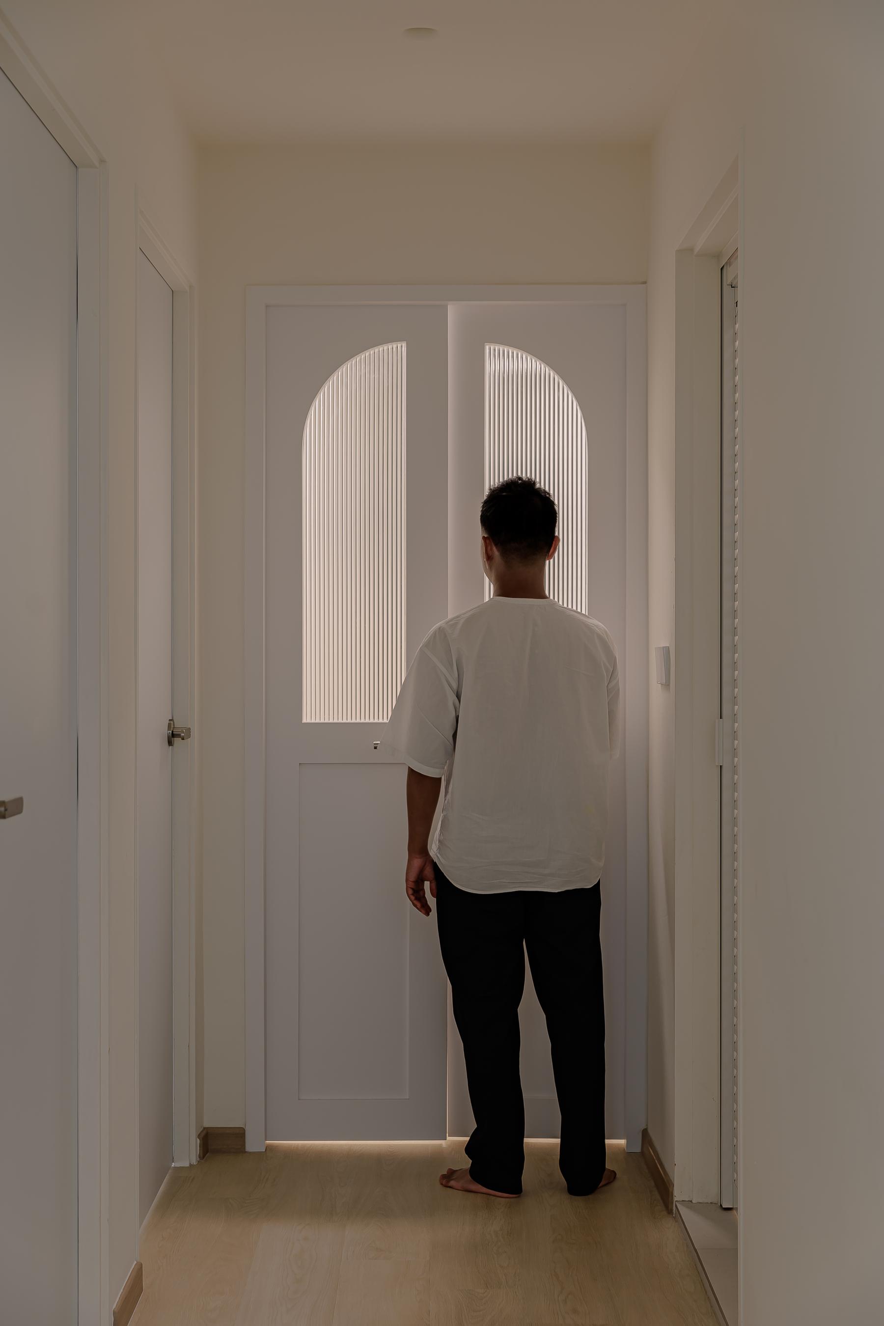 Minimalist Hallway with Bookshelf and Artwork