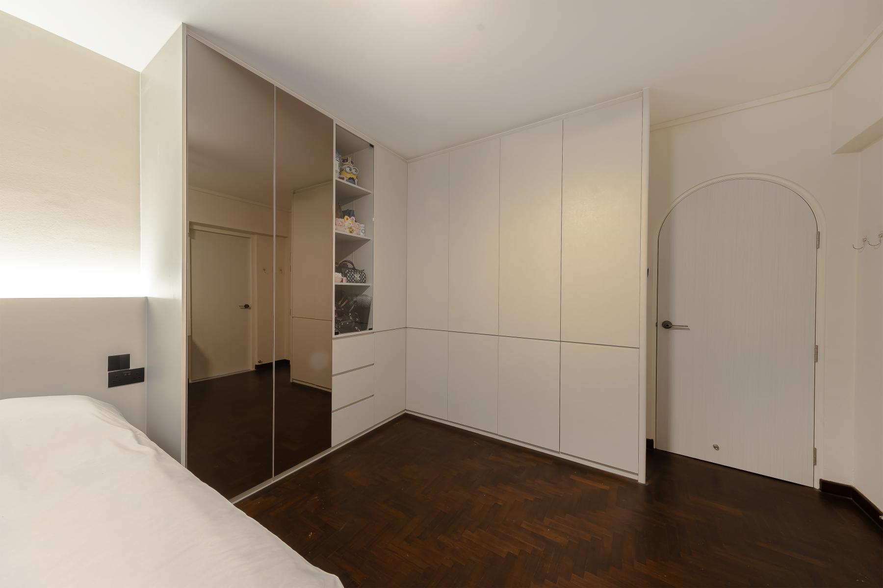 Minimalist Bedroom with Parquet Floor and Wardrobe