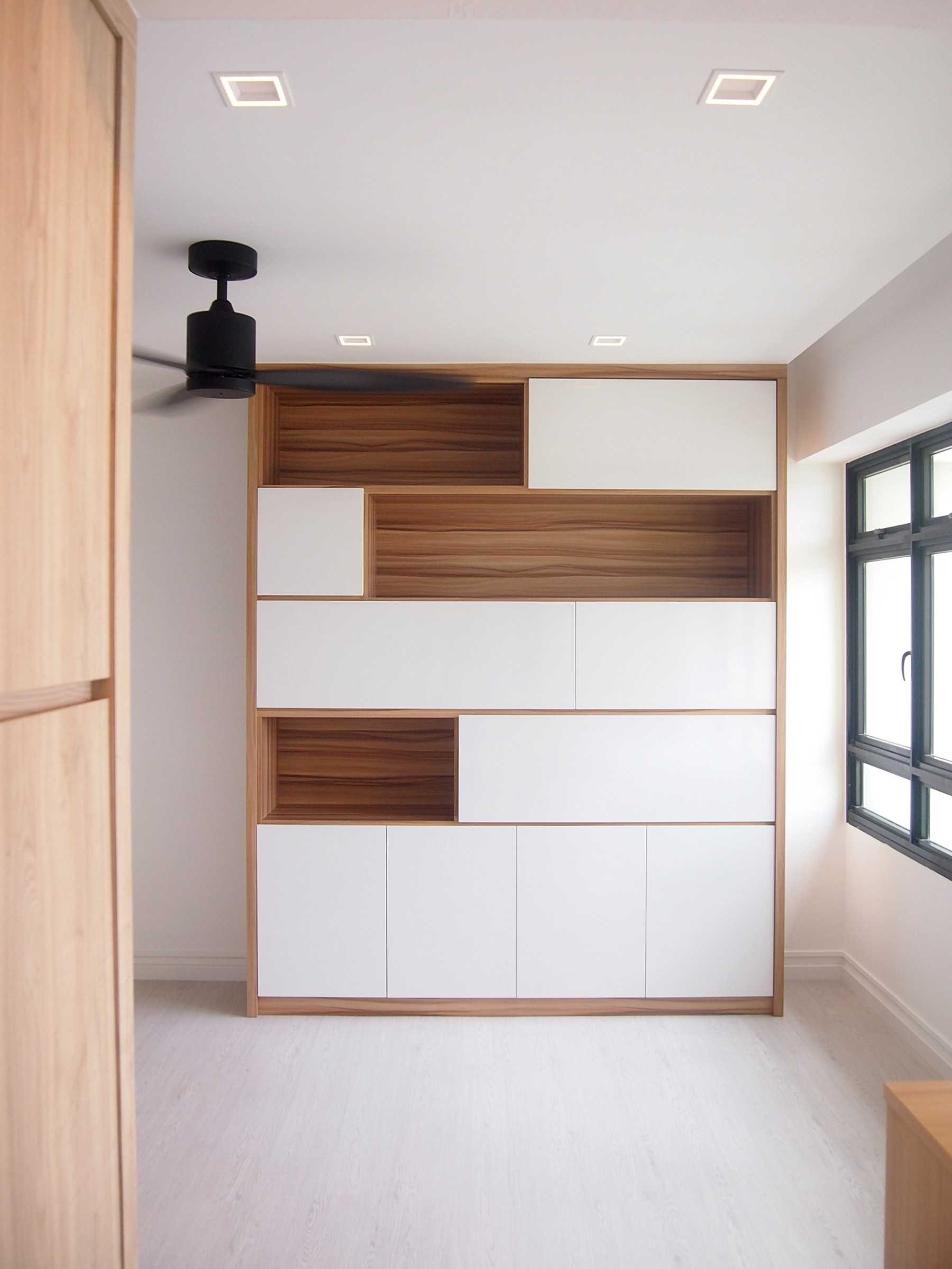 Scandinavian Hallway with Bookshelf and Artwork