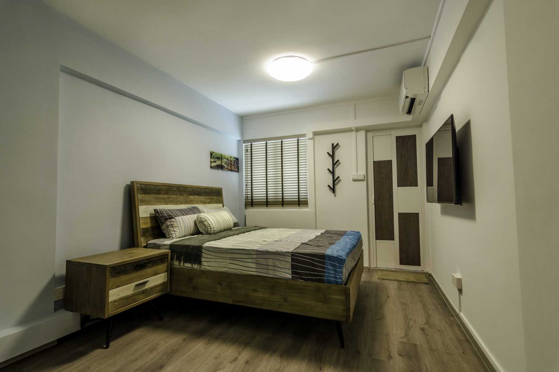Industrial Bedroom with Vinyl Flooring and Ceiling Light