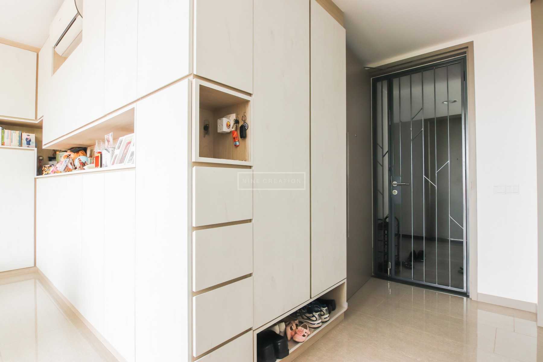 Scandinavian Entryway with Shoe Rack and Small Storage
