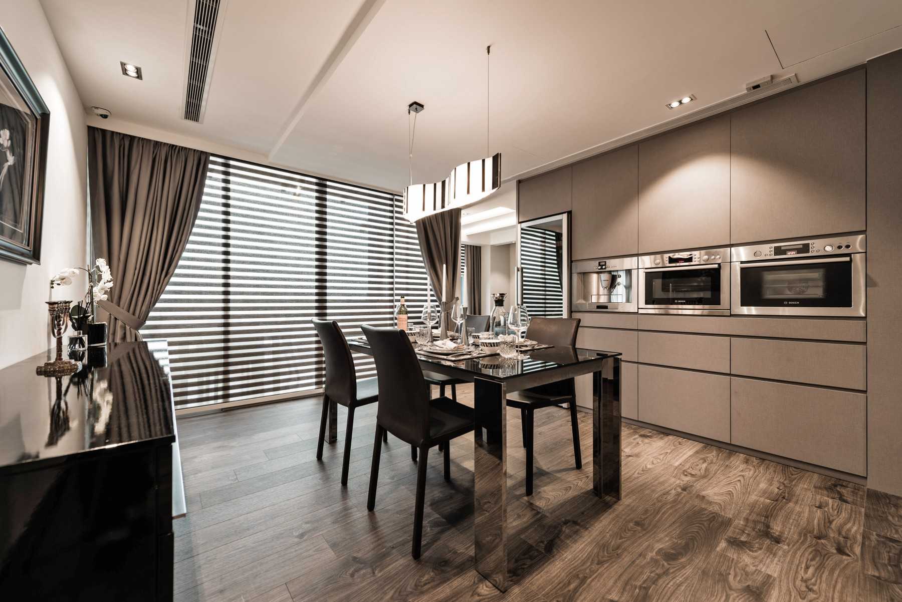 Modern Dining Room with Cove Lighting and Chandelier