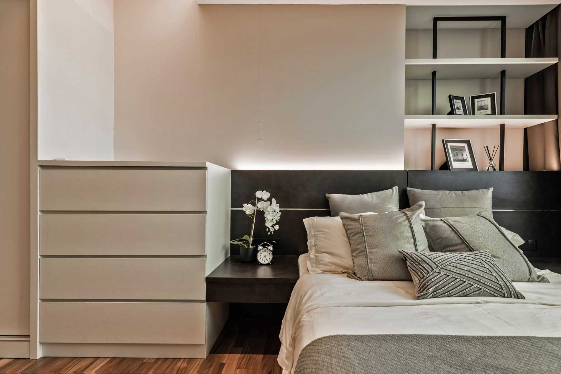 Modern Bedroom with Cove Lighting and Built-in Bed