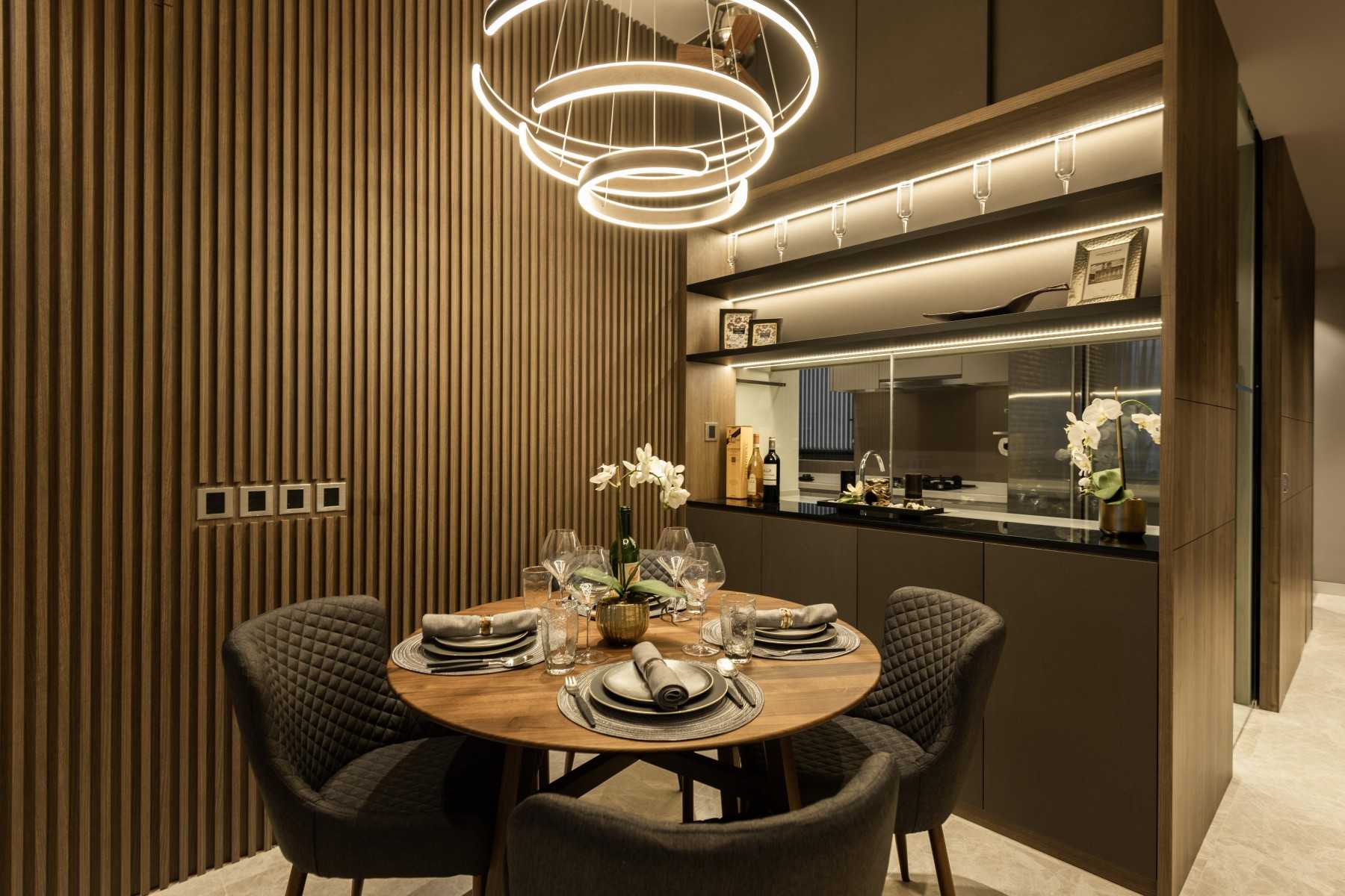 Asian Dining Room with Cove Lighting and Chandelier