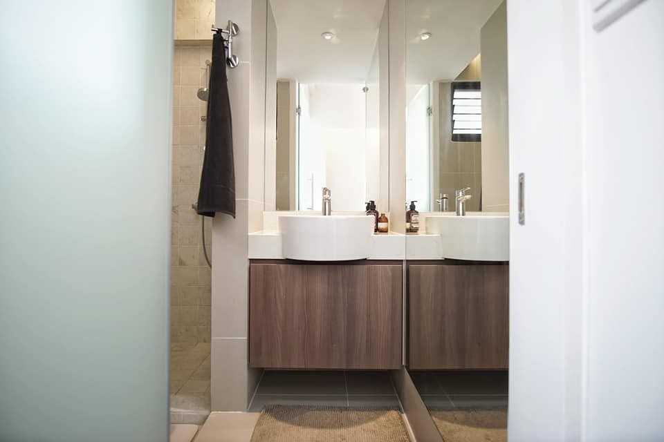 Minimalist Bathroom with Mirror and Rainshower