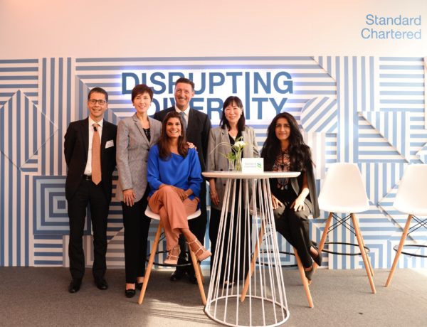 Group photo at Standard Chartered Bank's IWD breakfast event