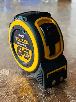Picture of TOLSEN Measuring Tape 5M/16FT with Nylon Coated Blade Industrial TPR Handle 36004 - Kings Trading
