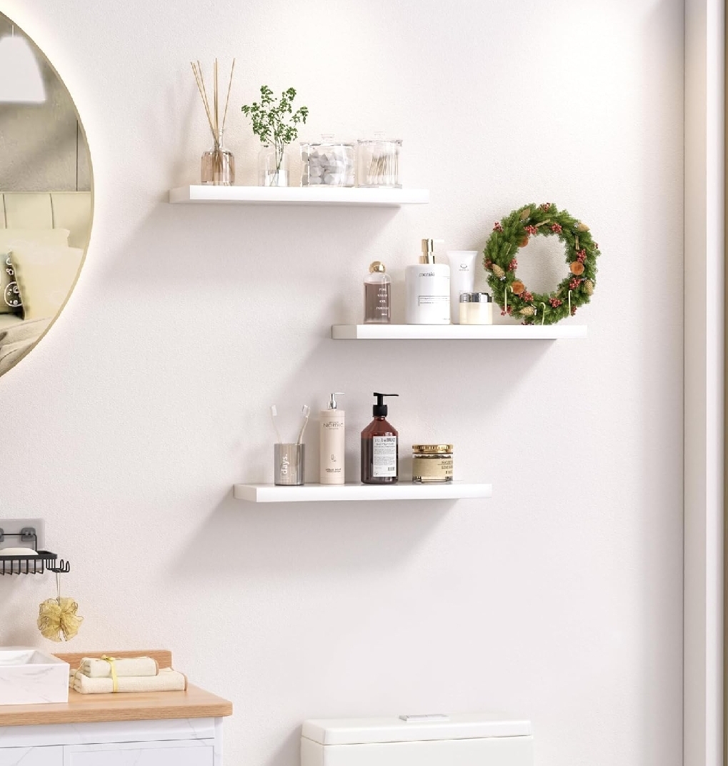 Picture of Set of 3 Floating Shelves, Wall Mounted
Shelves with Invisible Brackets, Wall Shelves
for Bathroom, Bedroom, Office, Living Room,
Kitchen, Shelves for Wall Decor Storage, White
Set of 3 (White 12/6 Set of 3)