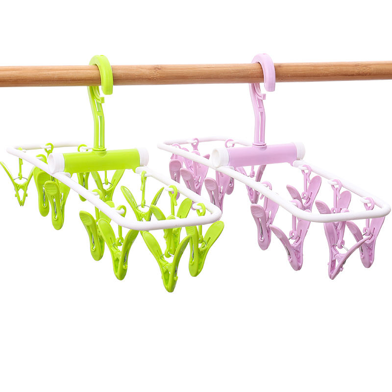 Picture of Folding plastic clothes hanger pegs with 12 clips socks drying hanger set