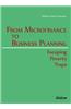 From Microfinance to Business Planning: Escaping Poverty Traps